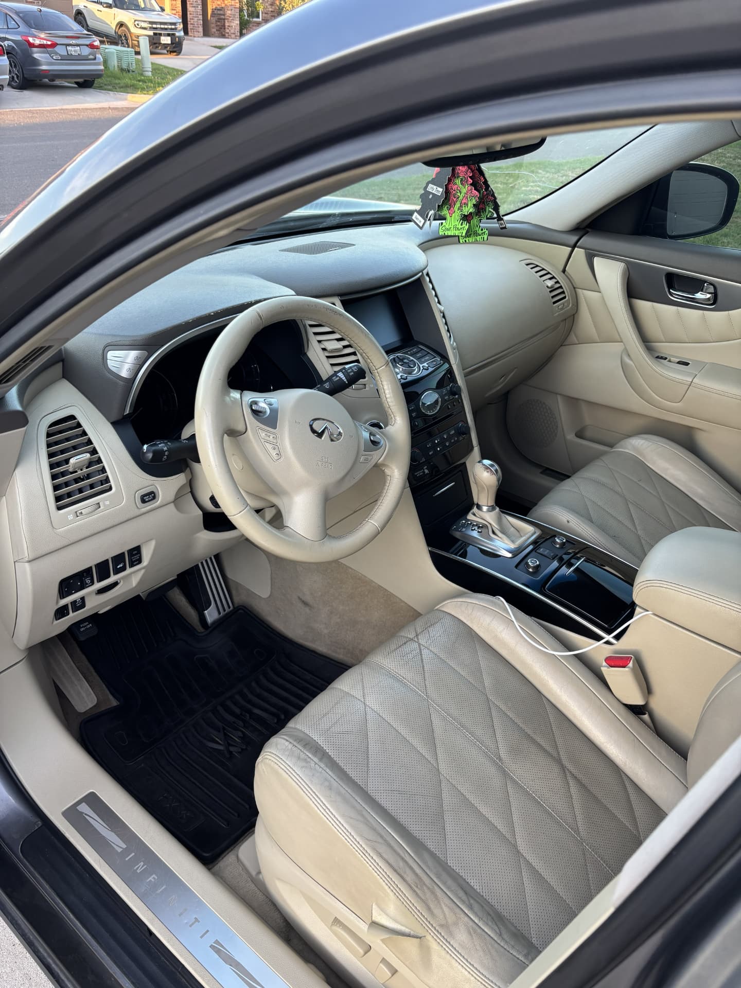 Infiniti tan leather interior cleaned and conditioned